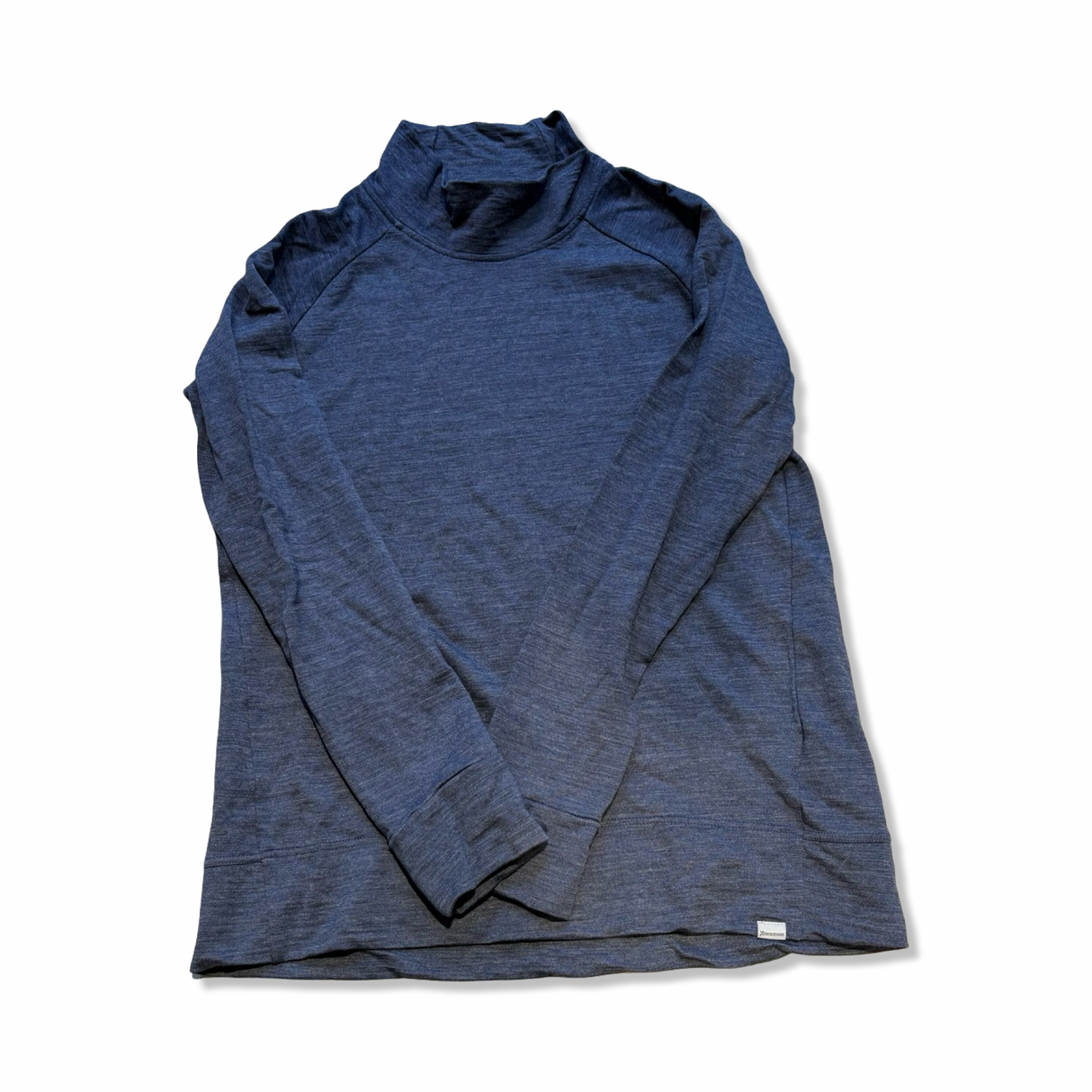 Gråmelerad Houdini Activist Turtleneck för dam, långärmad polotröja i merinoull mot vit bakgrund.