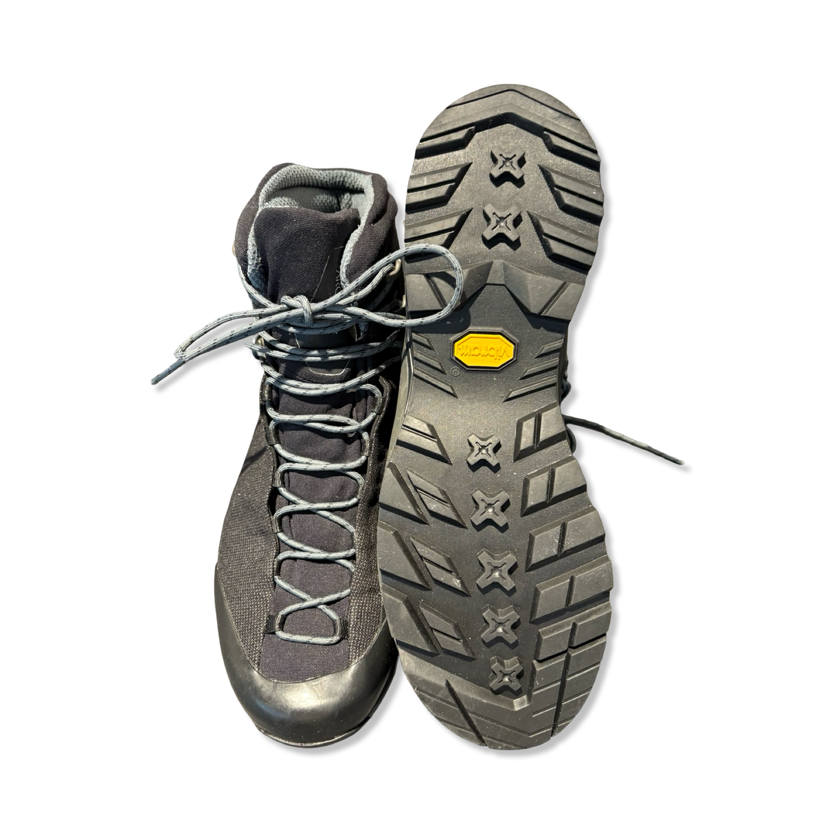 Black Arc'teryx Acrux TR GTX men's hiking boot shown from the front and outsole against a white background.