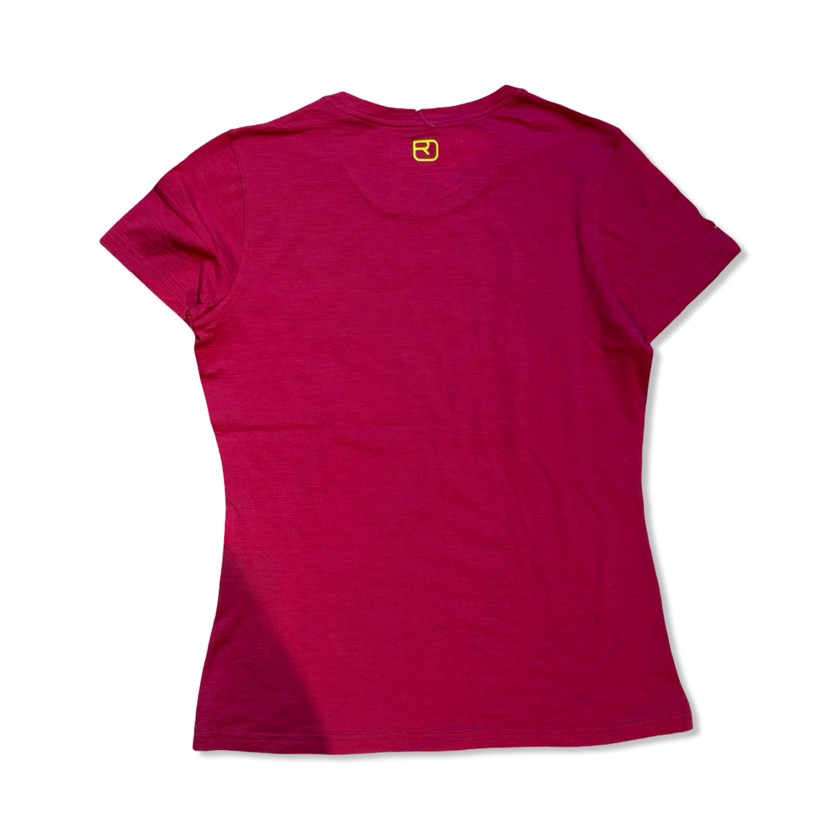 Röd Ortovox t-shirt för dam, sedd bakifrån mot en vit bakgrund.