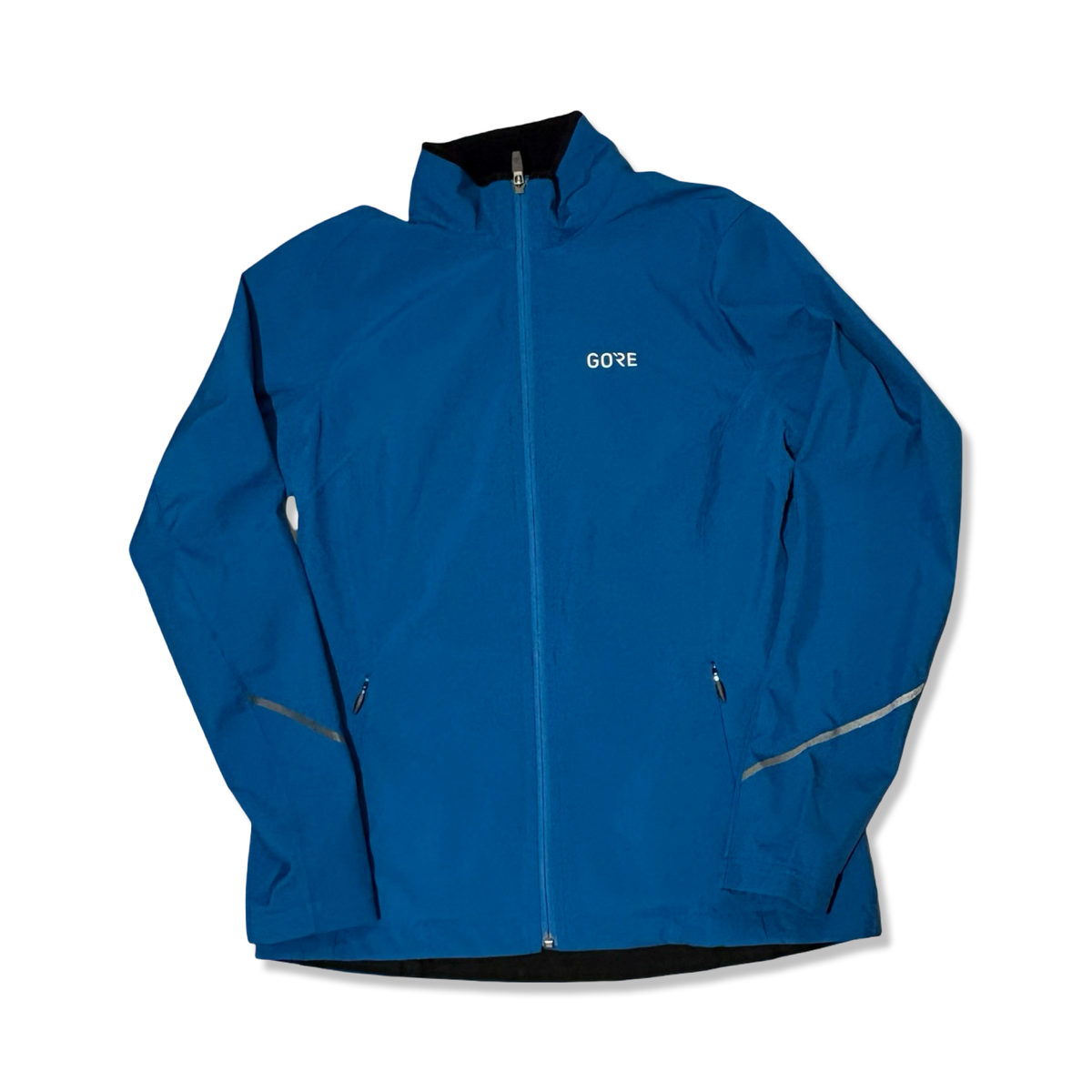 Blue Gore Wear women's windstopper jacket with a zipper and reflective details, front view against a white background.