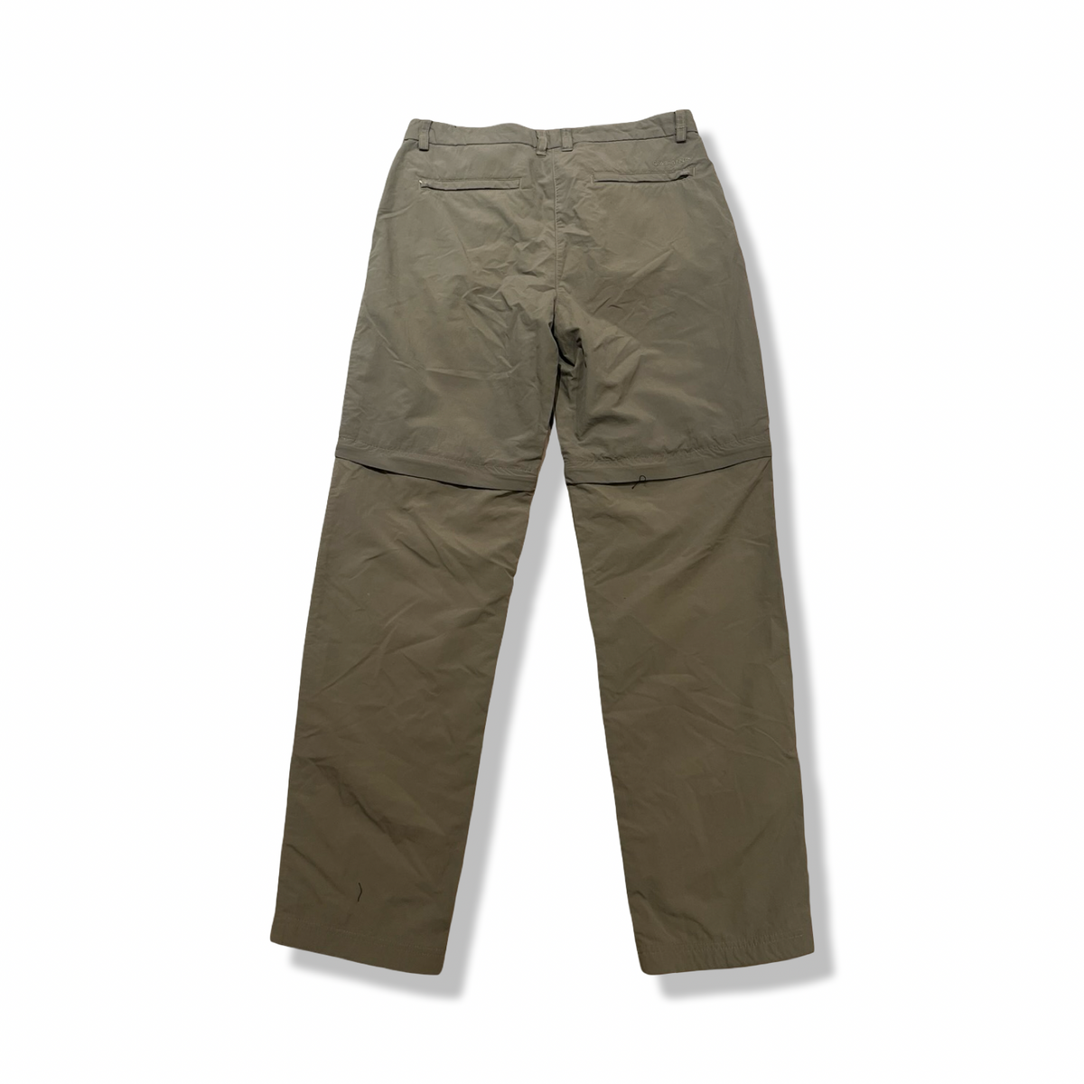 Back view of a green Craghoppers women's functional trousers against a white background.