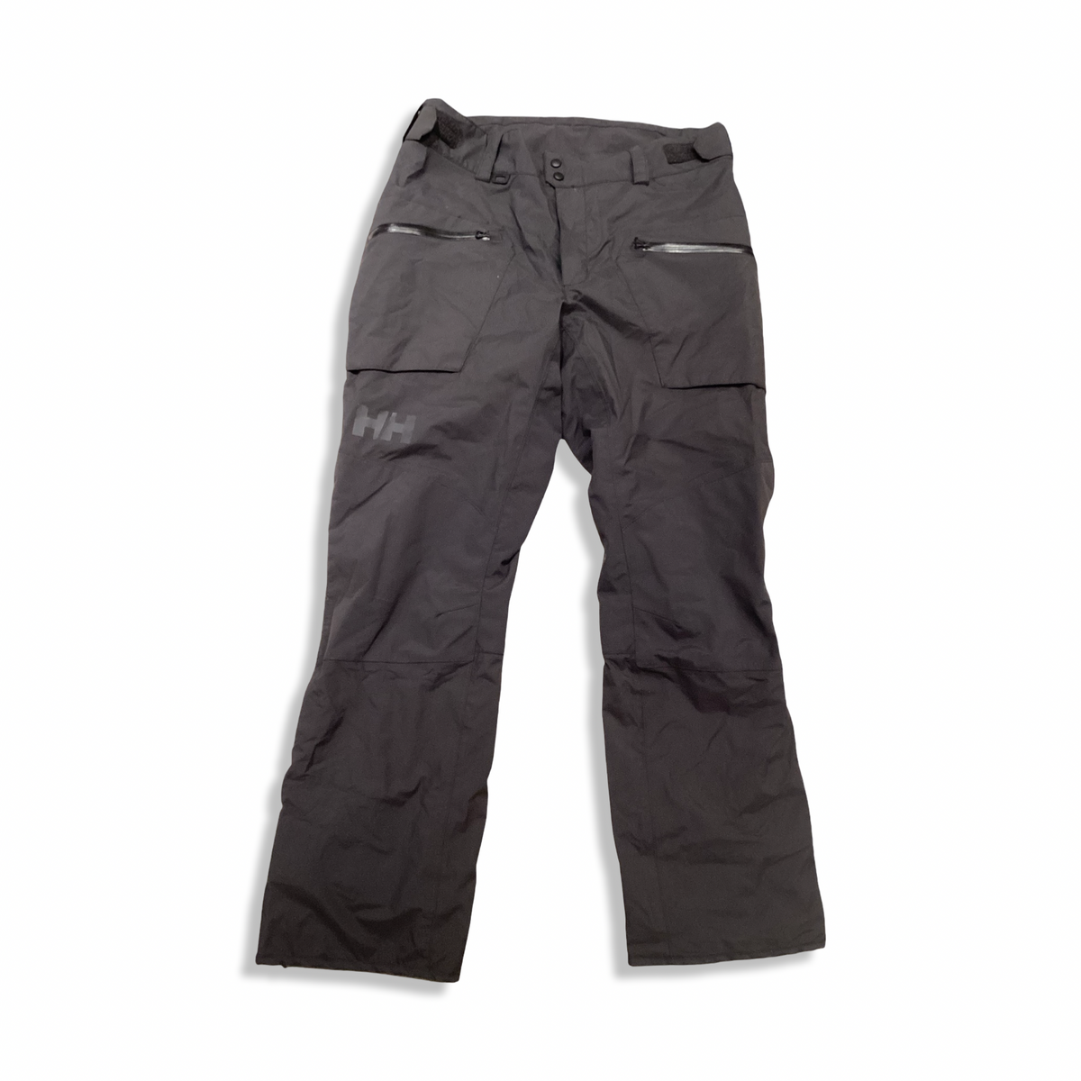 Grey Helly Hansen men's sailing trousers with zippered pockets, front view against a white background.