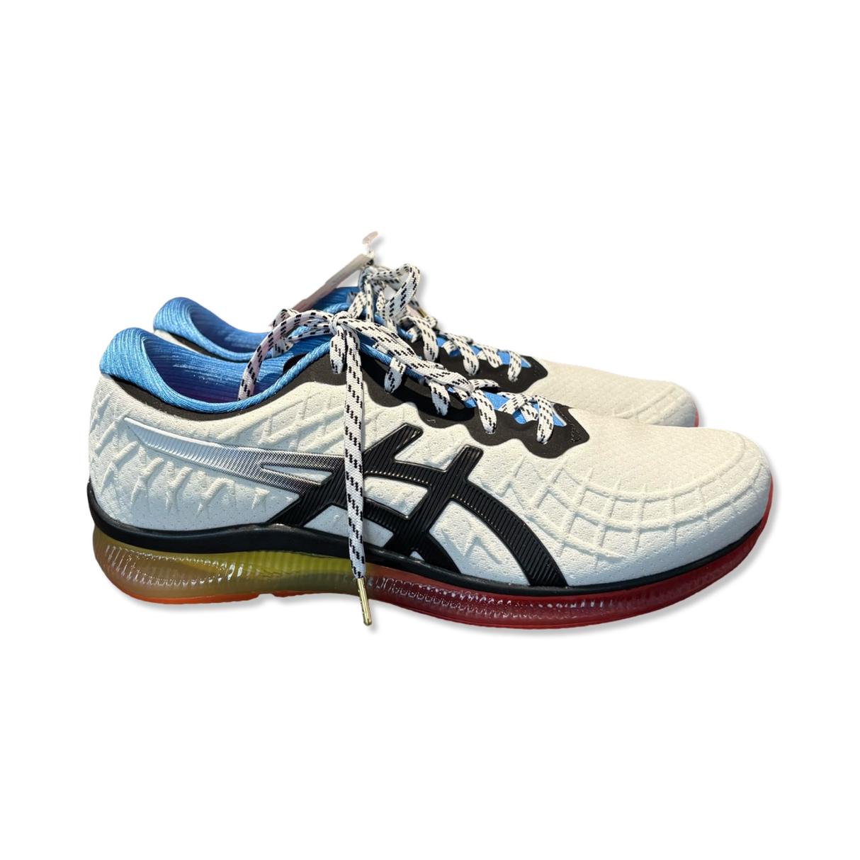 White Asics Gel-Quantum Infinity women's training shoes with black details and blue lining, viewed from the side against a white background.