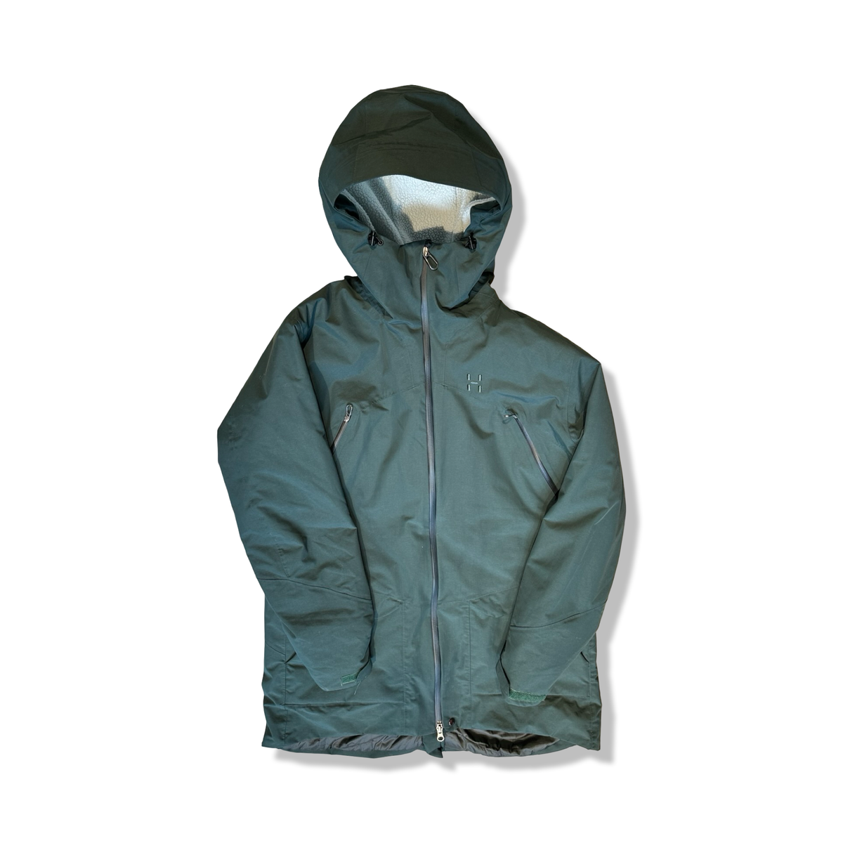 Green Haglöfs women's Torsång Parka down jacket, front view against a white background.