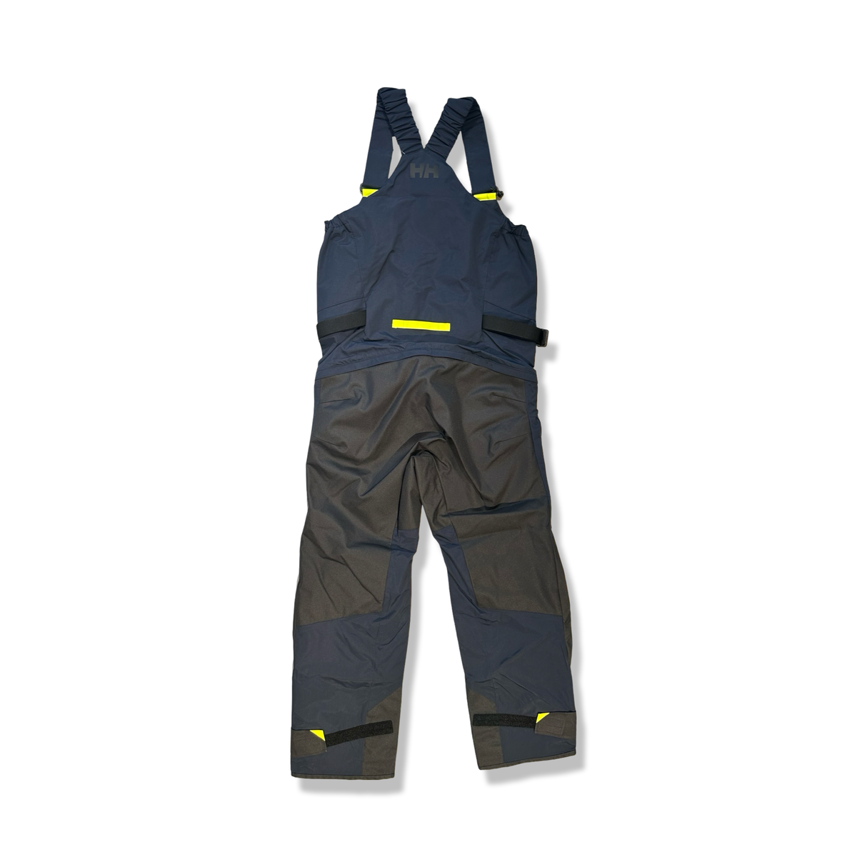 Baksidan av marinblå seglarbyxor modell Skagen offshore för dam från Helly Hansen, fotograferad mot vit bakgrund.