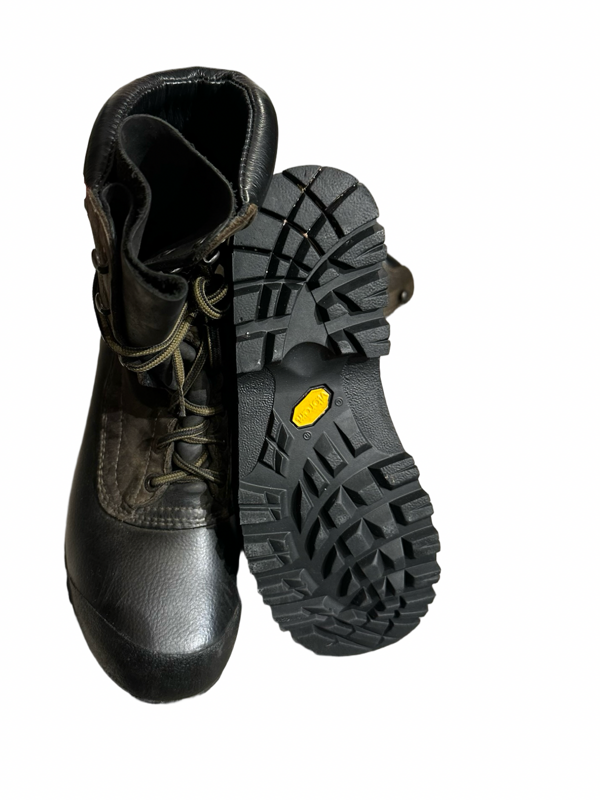 Underside and shaft of a brown Lundhags Vandra II Mid men's hiking boot with a grooved Vibram sole.