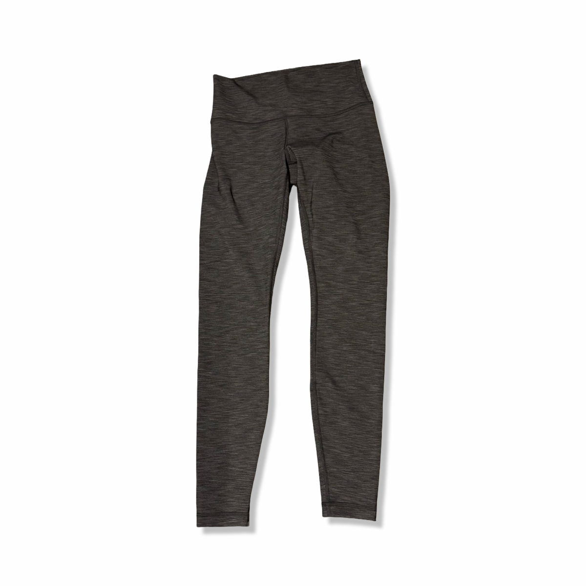 Grå träningstights från Lululemon i dammodell, fotograferade framifrån mot en vit bakgrund.