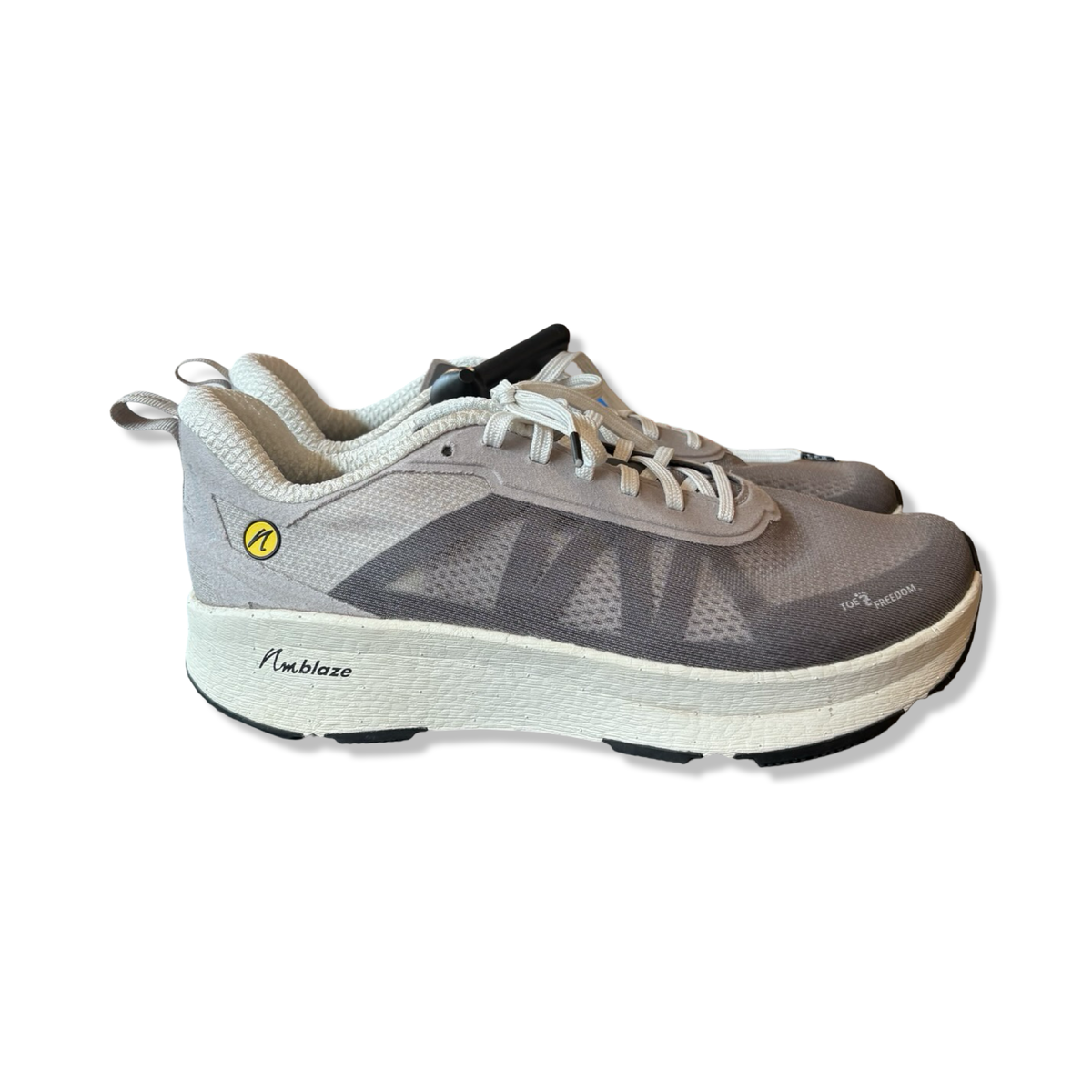 Grey Joe Nimble Addict Pro R men's running shoes with thick white sole, photographed from the side against a white background.