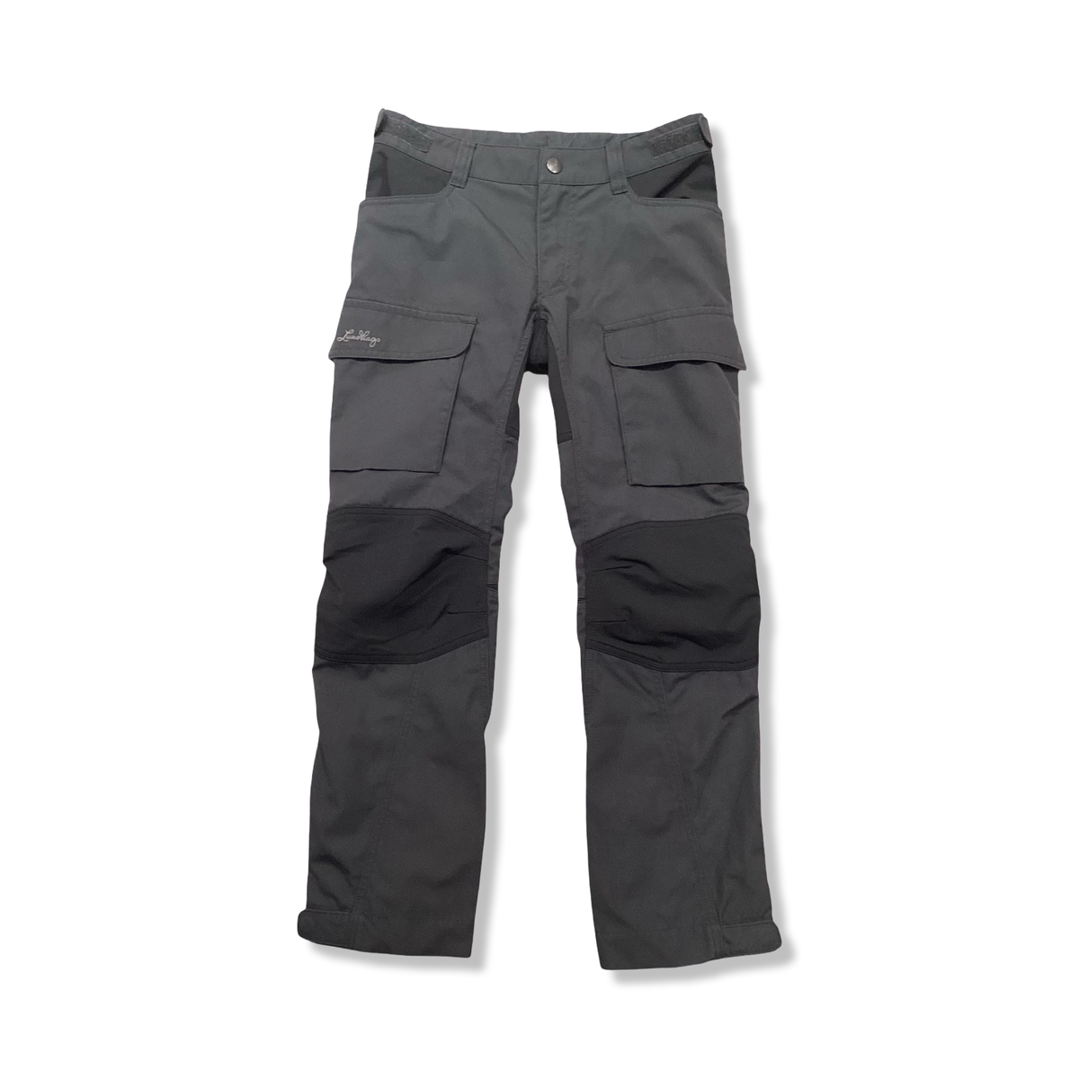 Grey Lundhags kids' hiking trousers with reinforcements on the knees and cargo pockets, front view against a white background.