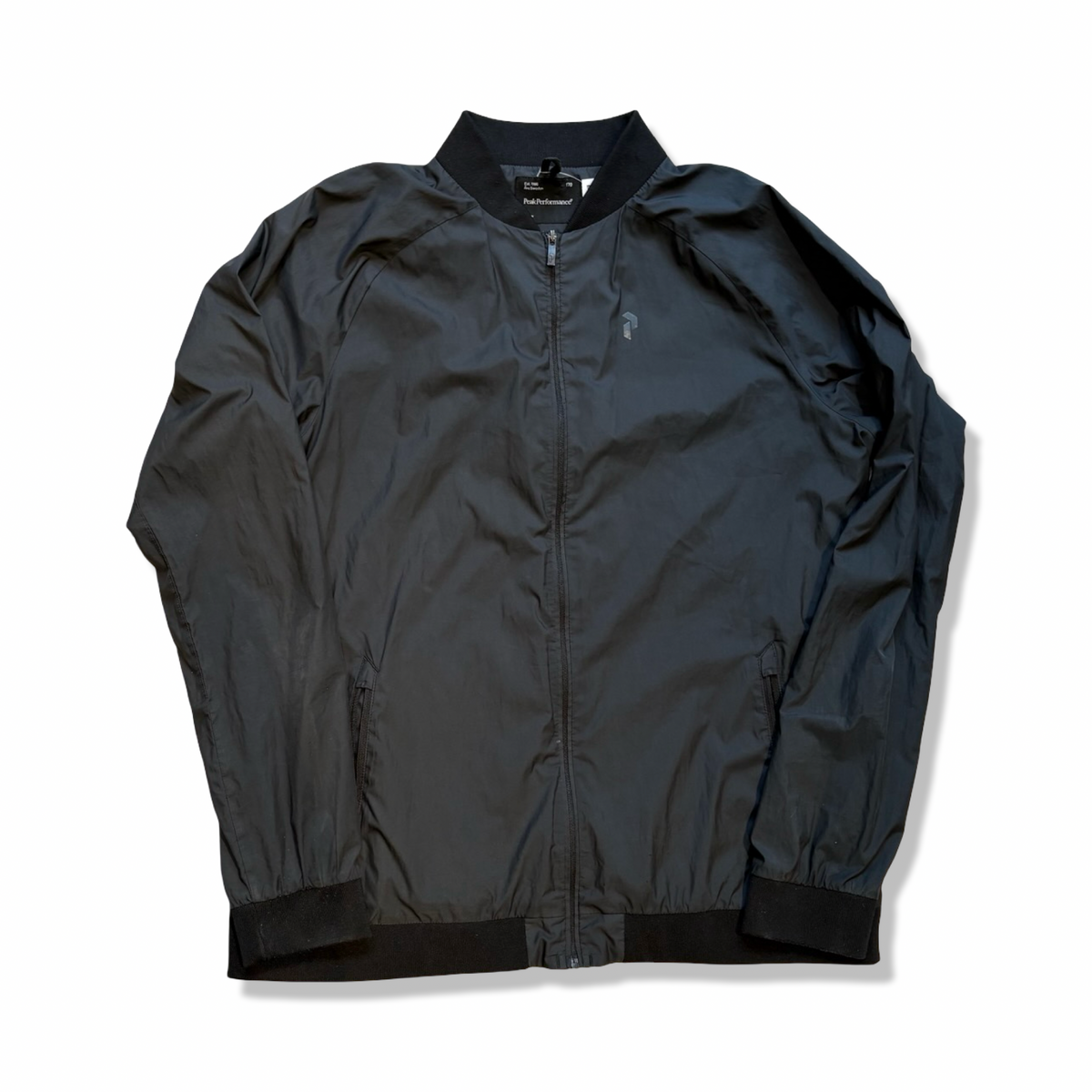 Black Peak Performance G Octon training jacket in size 170, front view against a white background.