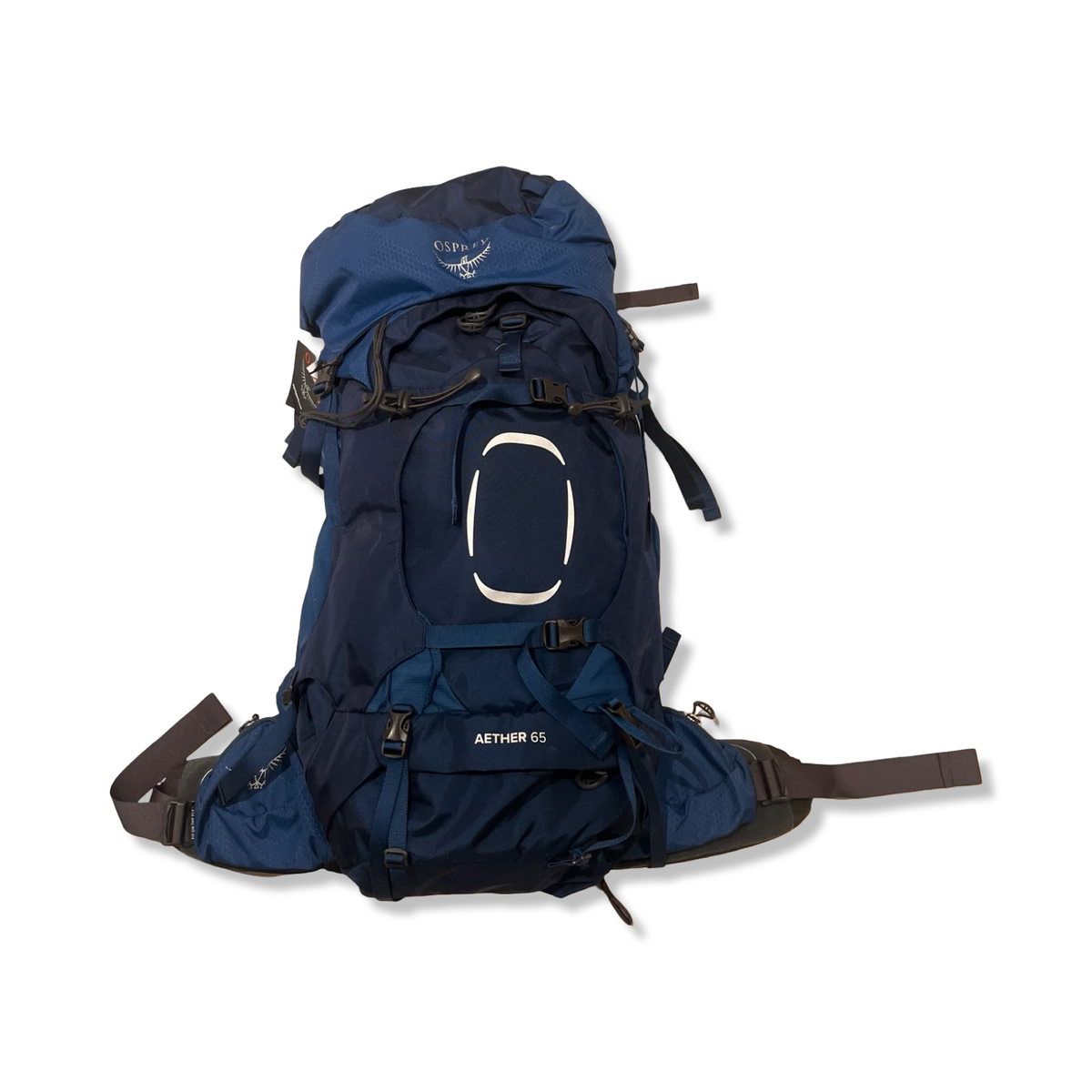 Blue Osprey Aether 65 L backpack with multiple buckles and straps, front view against a white background.