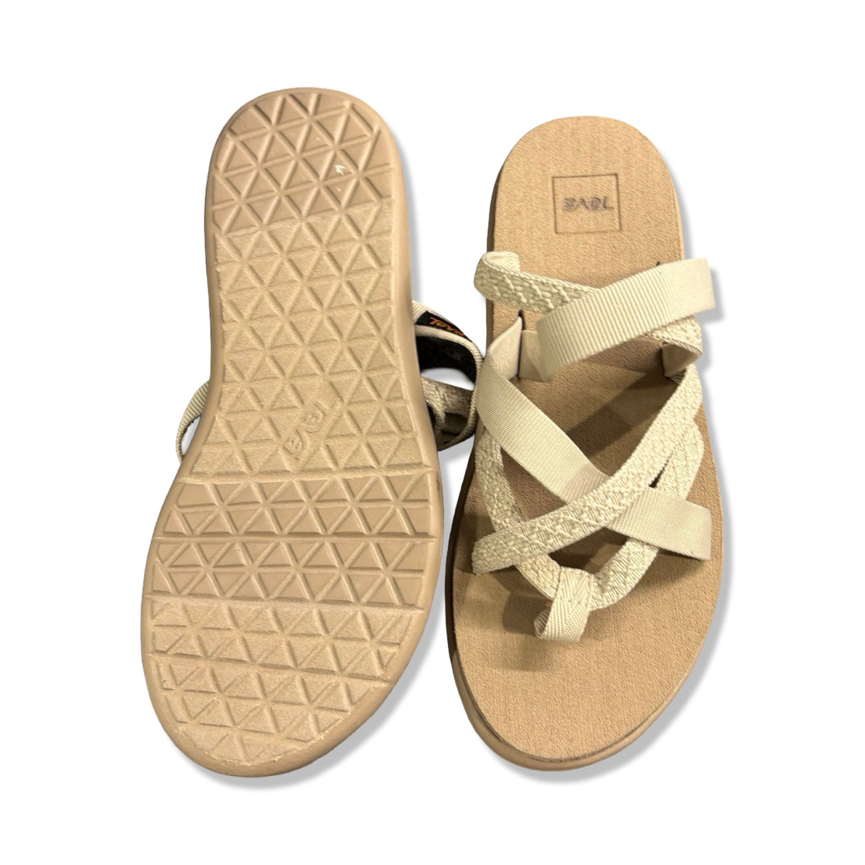Beige Teva Voya Zillesa sandaler för dam, sedda ovanifrån med fokus på remmar och den mönstrade sulan.