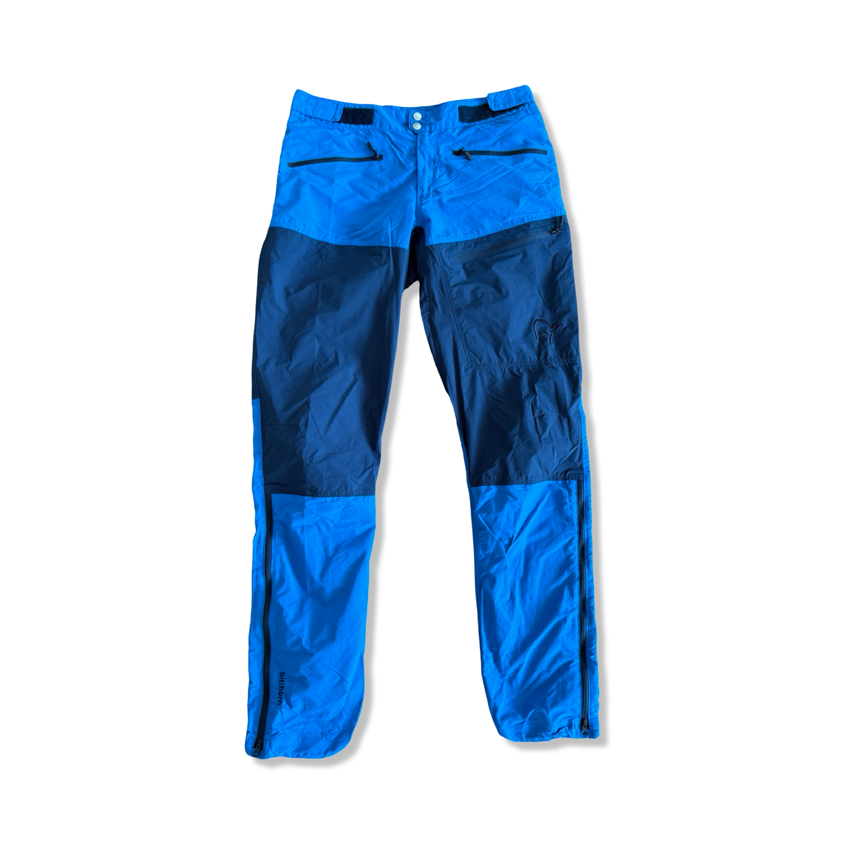 Men's Norröna Bitihorn hiking pants in a two-tone blue design, front view against a white background.