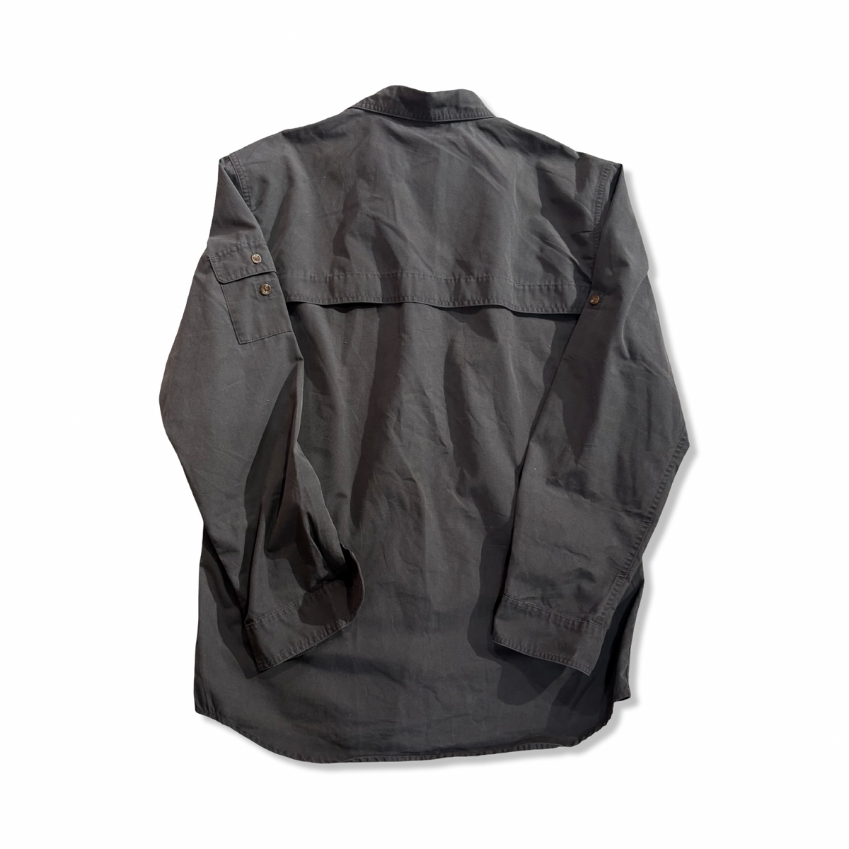 Back view of a grey Fjällräven Sarek men's trekking shirt against a white background.
