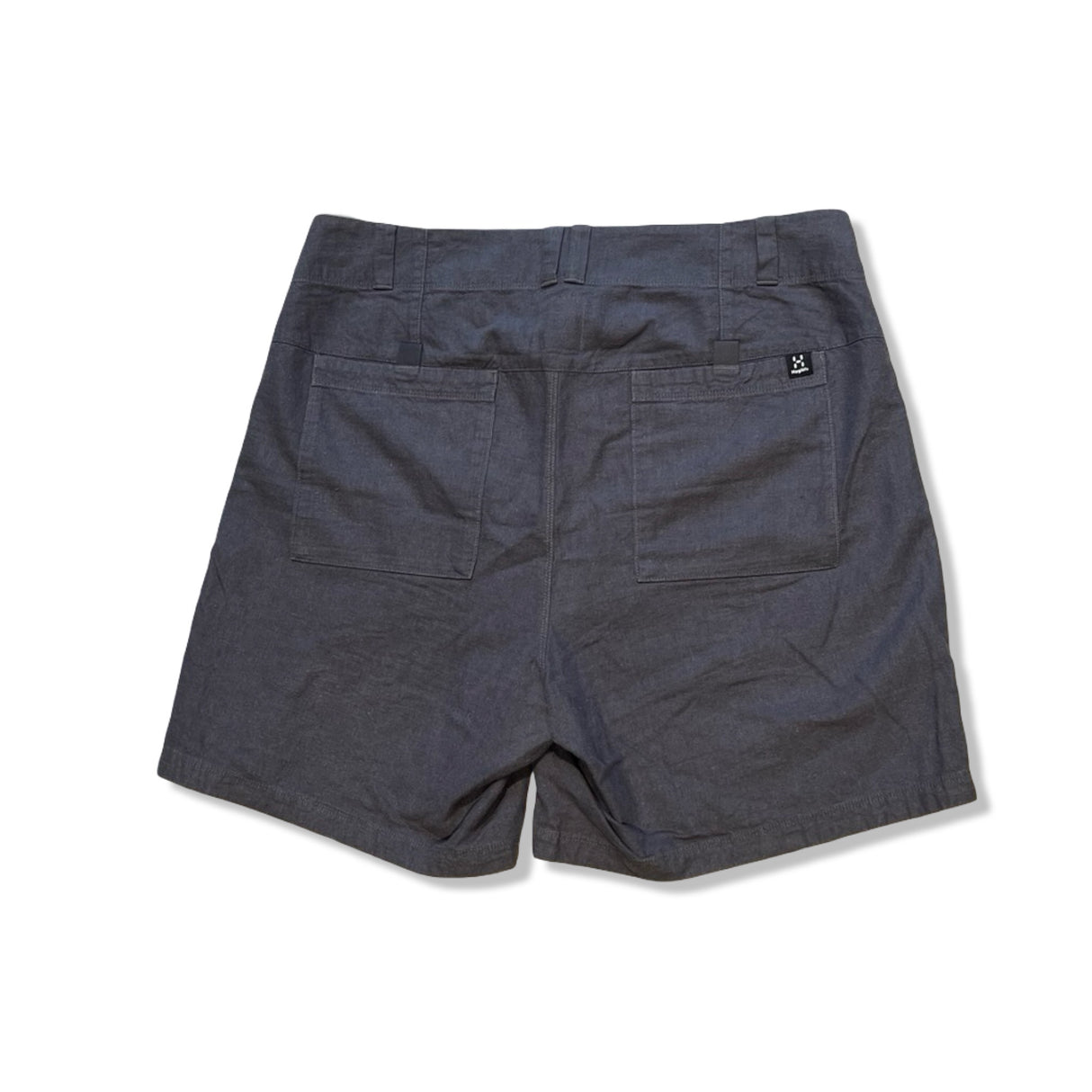 Gray Haglöfs women's Mid Hemp shorts with two back pockets, back view against a white background.