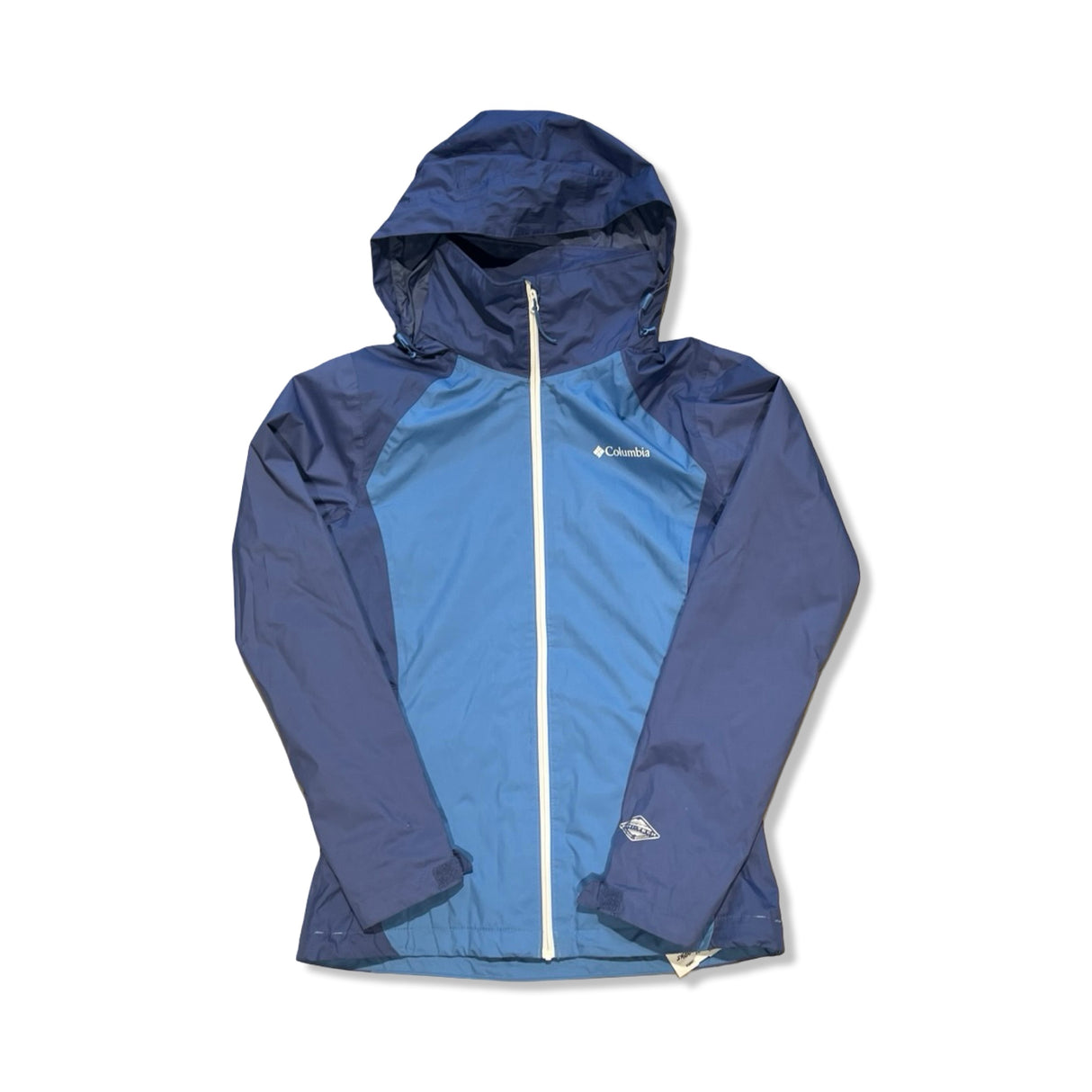 Blue two-toned Columbia women's windbreaker jacket with a hood and white zipper, isolated on a white background.