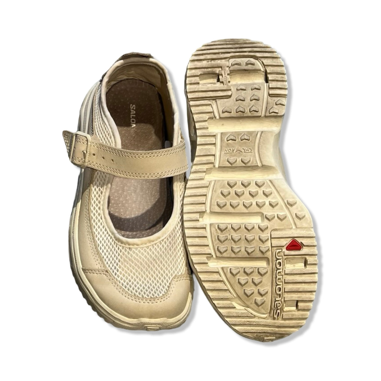 Salomon beige mesh Mary Jane sneakers with a buckle strap, featuring top and outsole views.