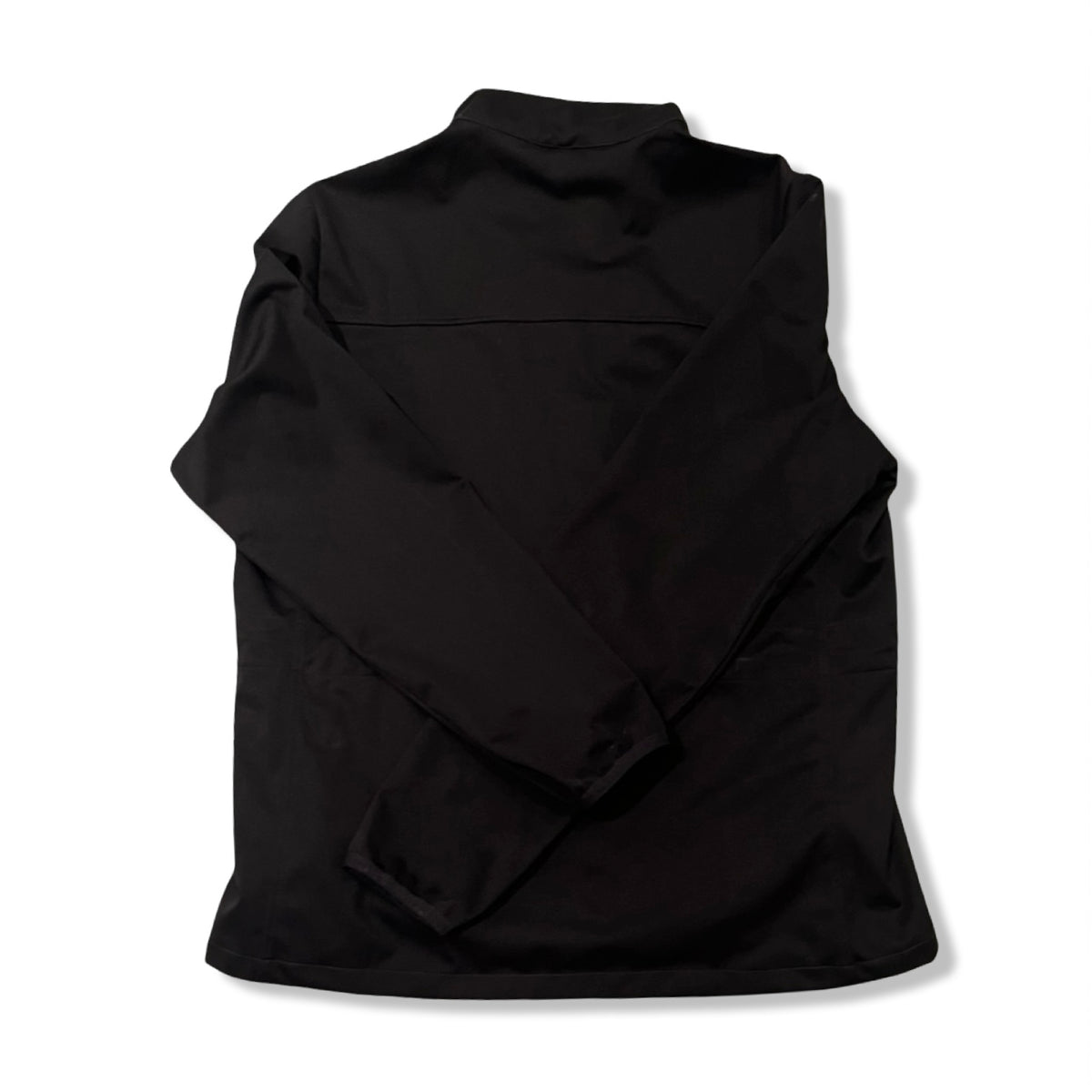 Back view of a black Röhnisch women's softshell jacket against a white background.
