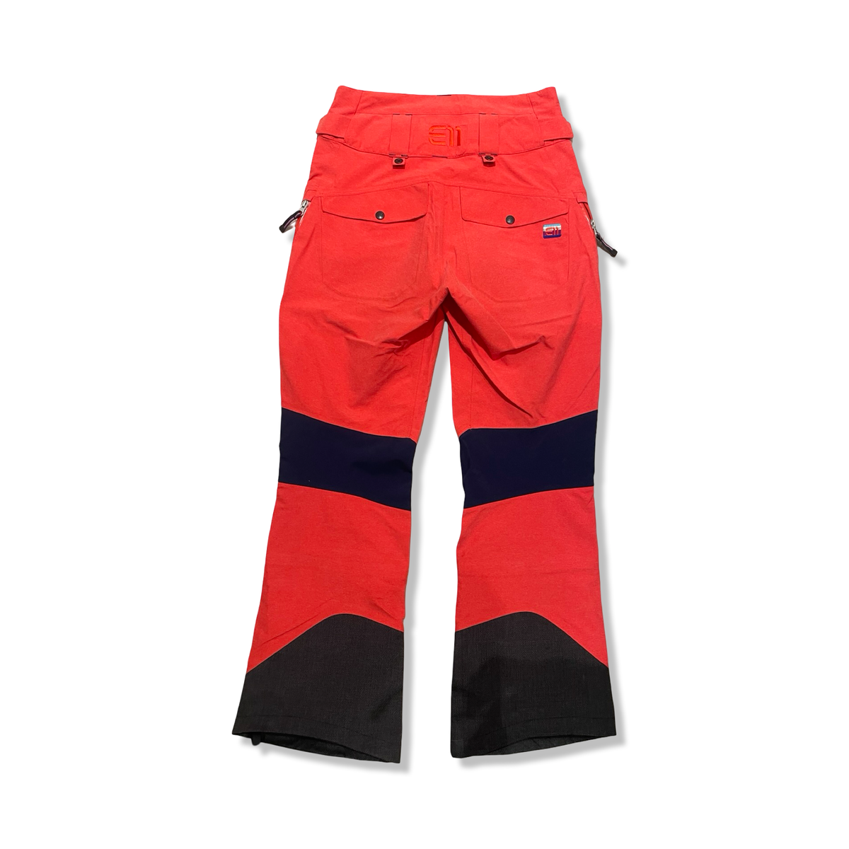 Back view of orange Elevenate women's shell pants in size XS against a white background.