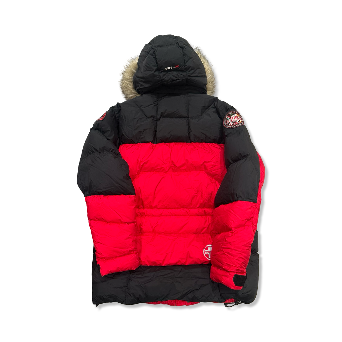 Back view of a red and black Ralph Lauren RLX Transglobal women's expedition parka with a hood against a white background.