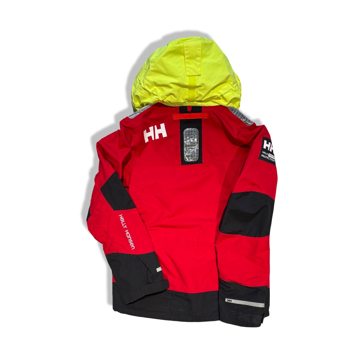 Baksidan av Helly Hansen seglarjacka för dam i rött med svarta detaljer och neongul huva.