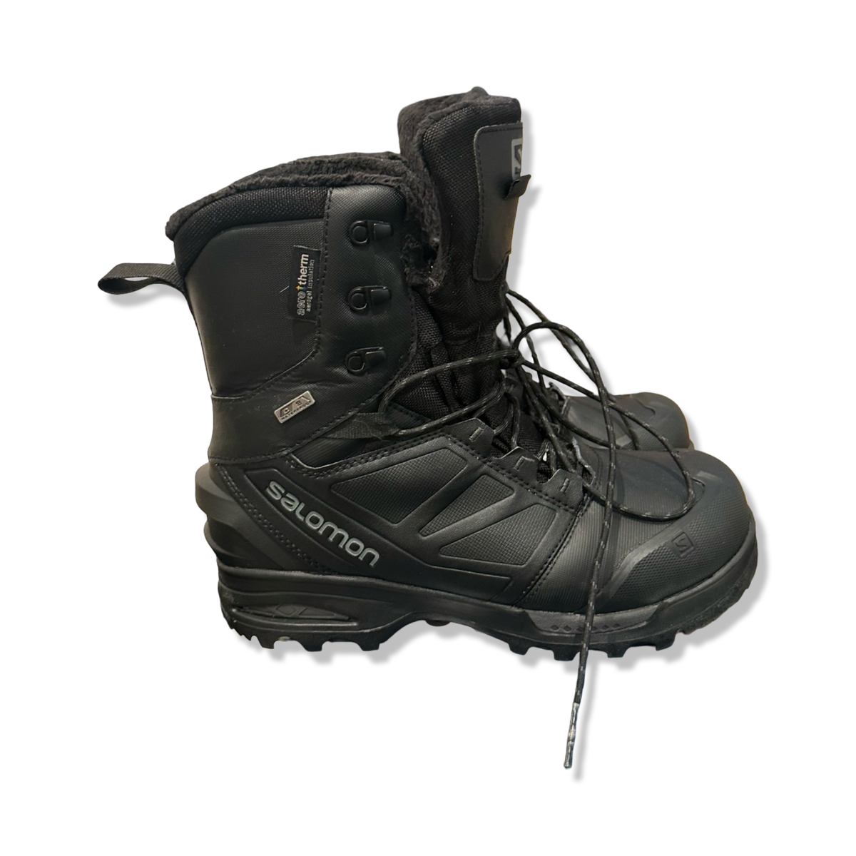 Black Salomon men's boots, side view against a white background.