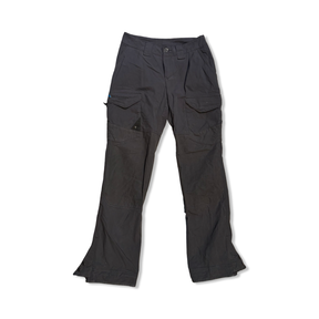 Grey Klättermusen women's hiking pants, front view against a white background.