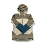 Beige and blue women's hooded shell jacket from Peak Performance, front view against a white background.