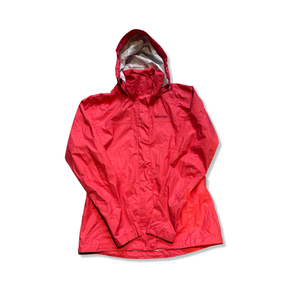 Women's pink Marmot shell jacket with a hood, flat lay view on a white background.