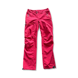 Red Houdini women's hiking trousers with a zipper, front view against a white background.