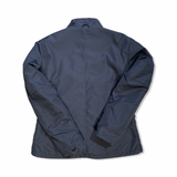 Back view of a blue Peak Performance men's synthetic jacket against a white background.
