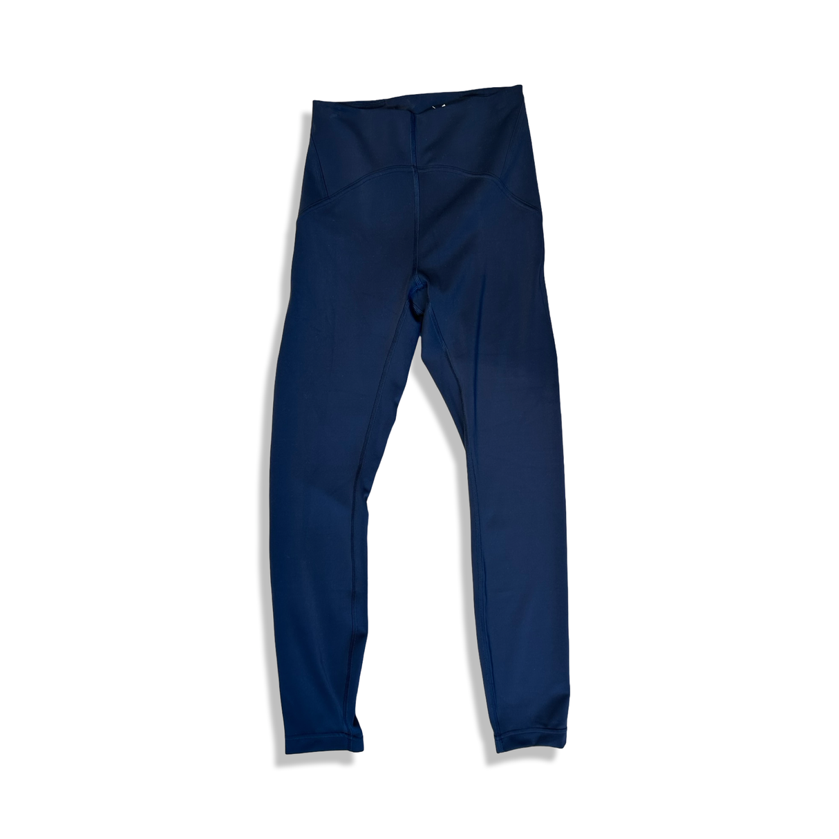Blå träningstights från Lululemon med fickor i modell för dam, fotograferade framifrån mot en vit bakgrund.