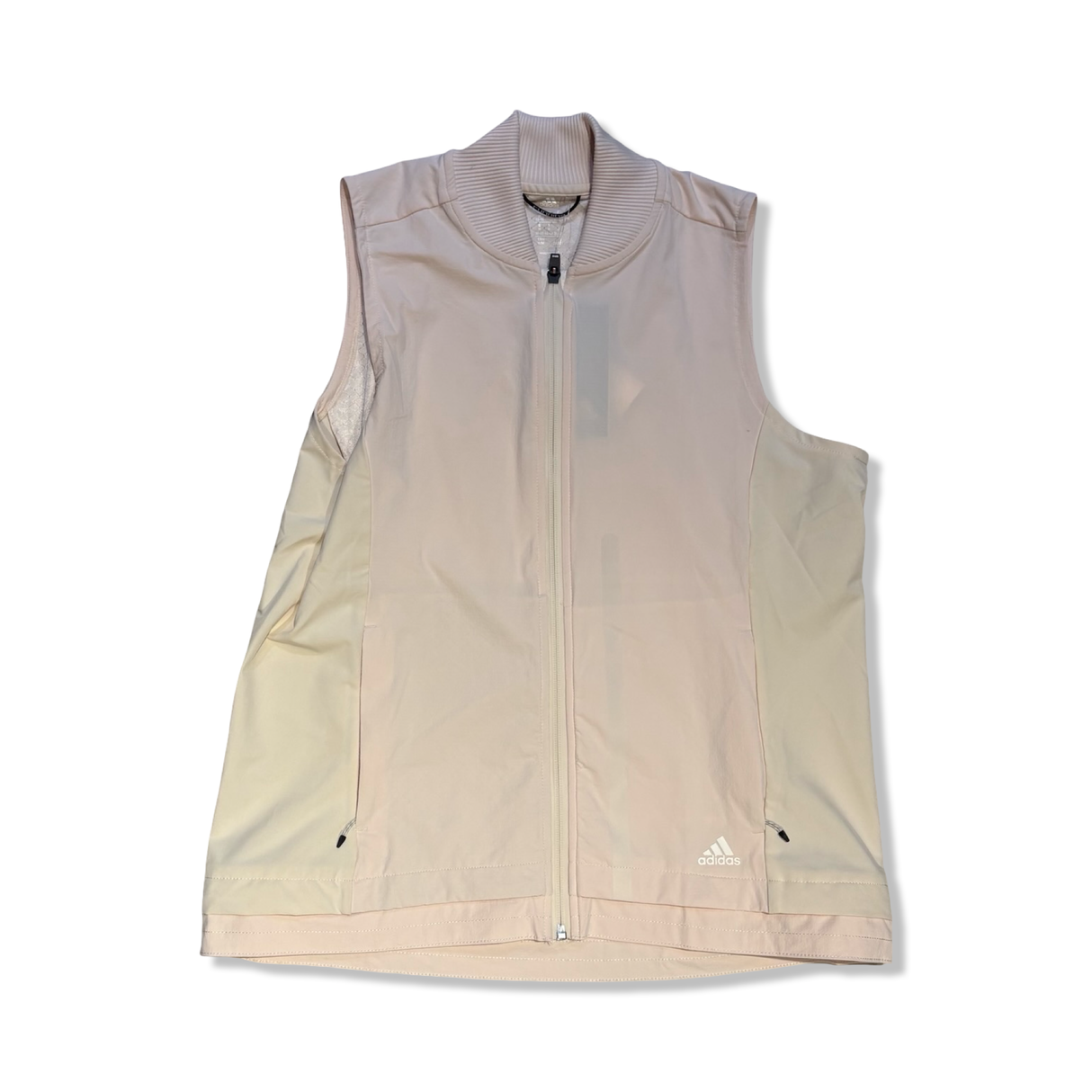Light pink Adidas women's training vest with a zipper, front view against a white background.