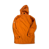 Back view of an orange Fjällräven women's functional jacket in size XS against a white background.