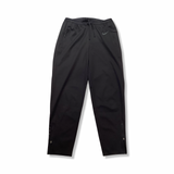 Black Nike women's training pants, front view against a white background.