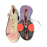 White and multicolor Nike Alphafly 3 unisex running shoes, showing upper side and outsole against a white background.