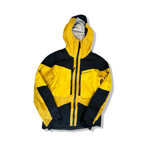 Yellow and black Peak Performance Gravity GORE-TEX 3L men's shell jacket, front view against a white background.