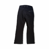 Black Helly Hansen women's ski pants, back view against a white background.