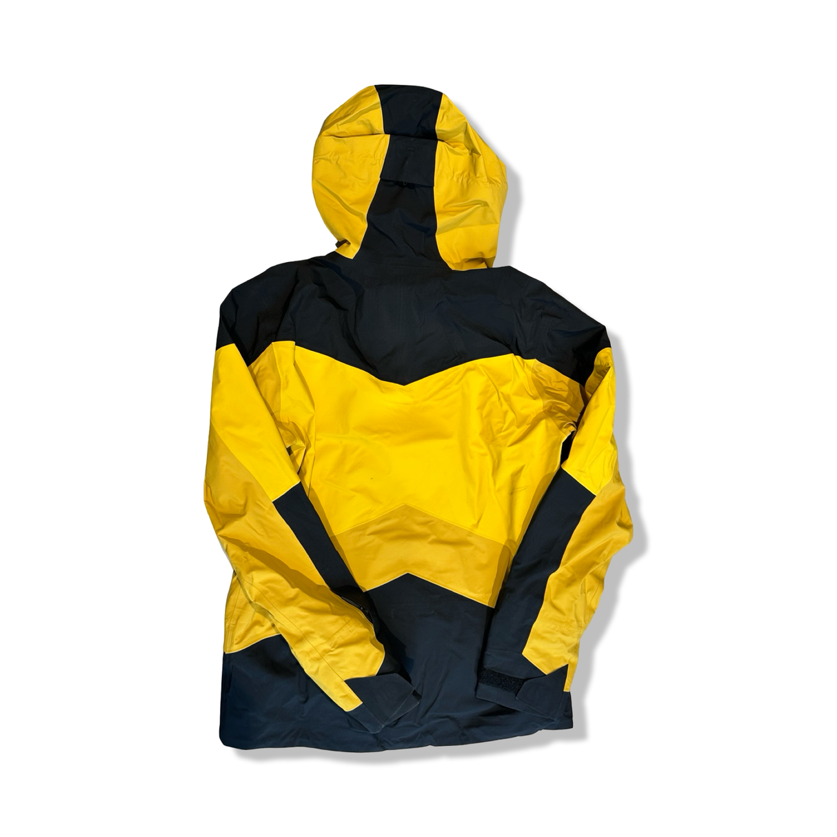Yellow and black Peak Performance Gravity GORE-TEX 3L men's shell jacket, back view against a white background.