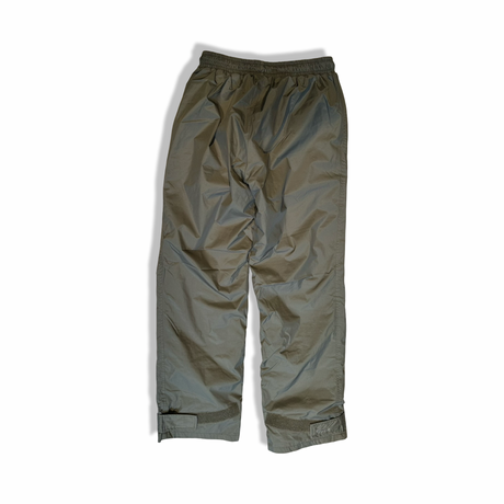 Back view of a green Fjällräven women's shell pants in size S against a white background.