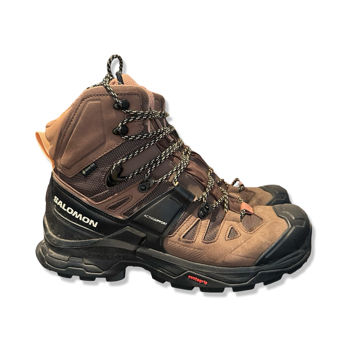 Brown Salomon QUEST 4 GORE-TEX men's hiking boots, photographed from the side against a white background.