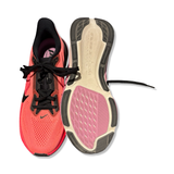 Orange and black unisex Nike Air Zoom Pegasus 42 running shoes with visible sole, photographed from the front and underneath against a white background.