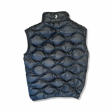 Back of a black Peak Performance Helium down vest for men, photographed against a white background.