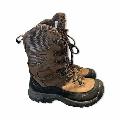 Brown TrekSta women's hiking boots with lace-up closure and waterproof design, side view against a white background.