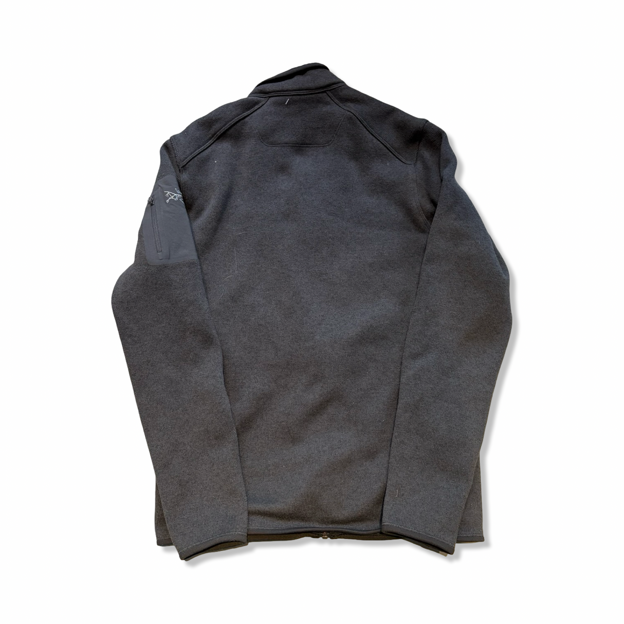 Men's Arc'teryx Covert Jacket fleece sweater in black, back view against a white background.