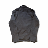 Men's Arc'teryx Covert Jacket fleece sweater in black, back view against a white background.
