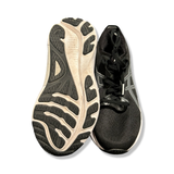 Black Asics Gel-Kayano 30 women's running shoes in size 38, shown with the outsole and upper side against a white background.