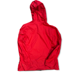 Back view of a red Columbia women's rain jacket with a hood against a white background.