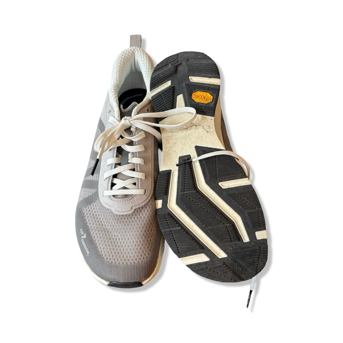 Grey men's Joe Nimble Addict Pro R running shoes, viewed from above with one shoe lying flat and the sole visible against a white background.