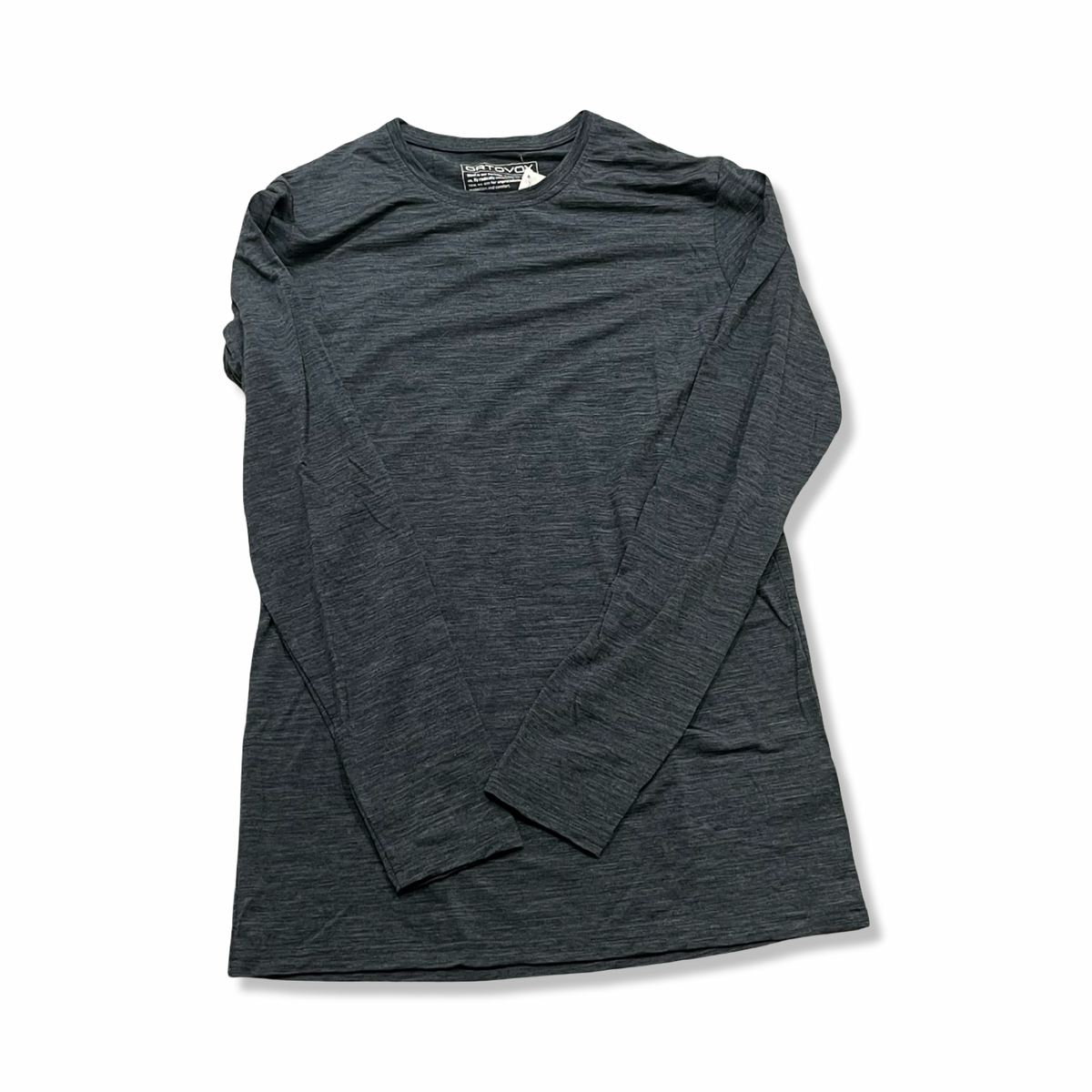 Green Ortovox men's long-sleeve base layer, front view against a white background.
